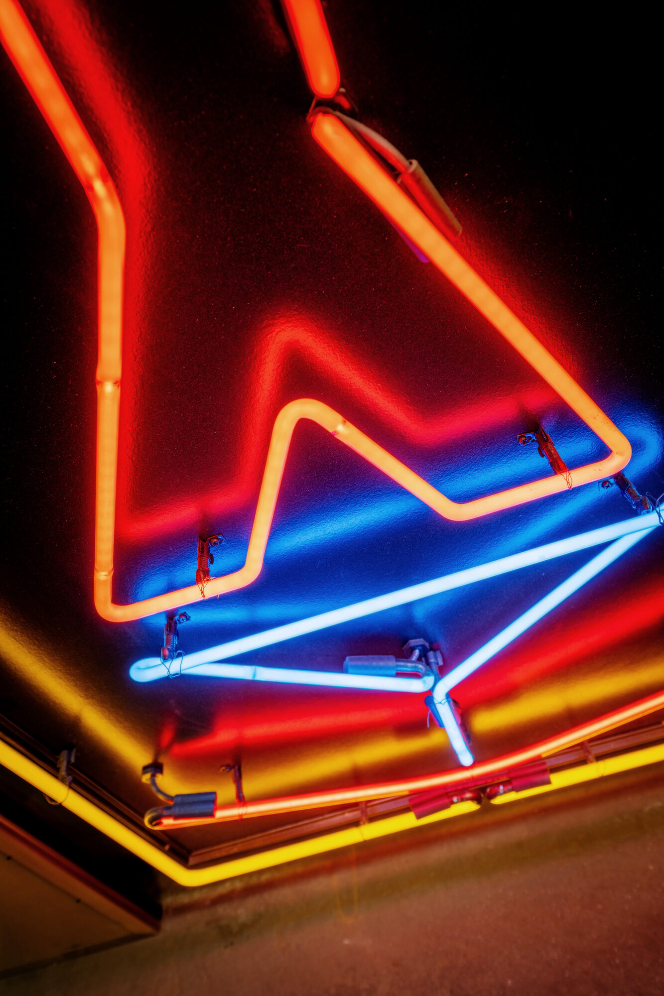 Neon artwork by Larry Simmons and Tony Greer, red, blue and yellow neon